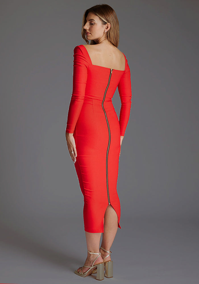 Side back image of a model wearing the Vesper Amy Sweetheart Neckline Long Sleeve Midaxi Dress in Red, highlighting the sleek fit, subtle curve-hugging shape, and elegant midaxi hem.