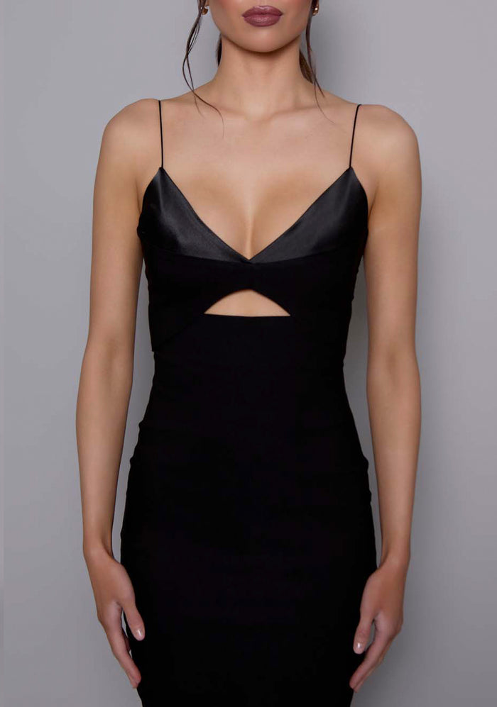 Close-up of the VSPR Angelina Strappy Cut Out Midaxi Dress in Black, highlighting the structured satin bust and central cut-out, emphasizing the luxurious texture and precise tailoring.