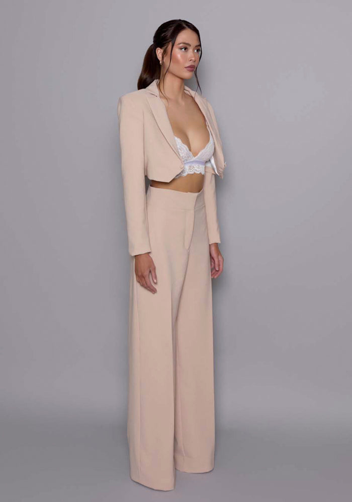 Side front view of the VSPR Aria cropped Jacket showing the sculpted waistline, clean lines, and elevated cropped silhouette with a polished finish.