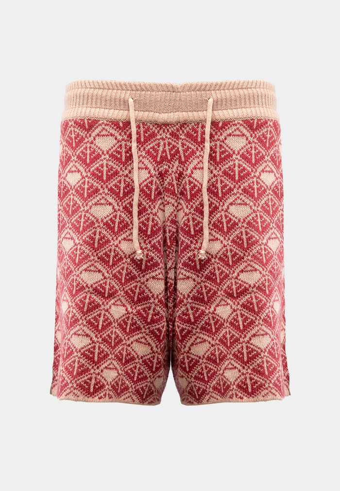 Ashluxe Monogram Knitted Shorts in pink and cream with drawstring waist and geometric knit pattern.