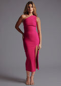 Front image of a model wearing the Vesper Ava One Shoulder Midaxi Dress in Cerise with an asymmetric neckline, thigh-high split, and sleek midaxi silhouette. against a grey studio backdrop.