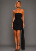 Front image of a model wearing the VSPR Belisse Strapless Black Mini Dress in Black, featuring a sculpted strapless neckline, slim body-contouring silhouette, and elegant drape detail against a grey studio backdrop.