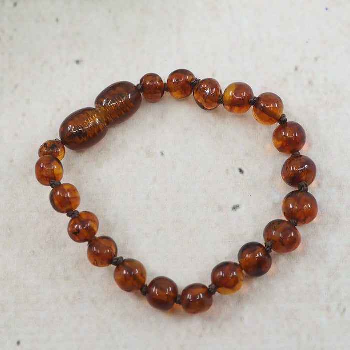 Bracelet d'ambre pour bébé - Cognac foncé