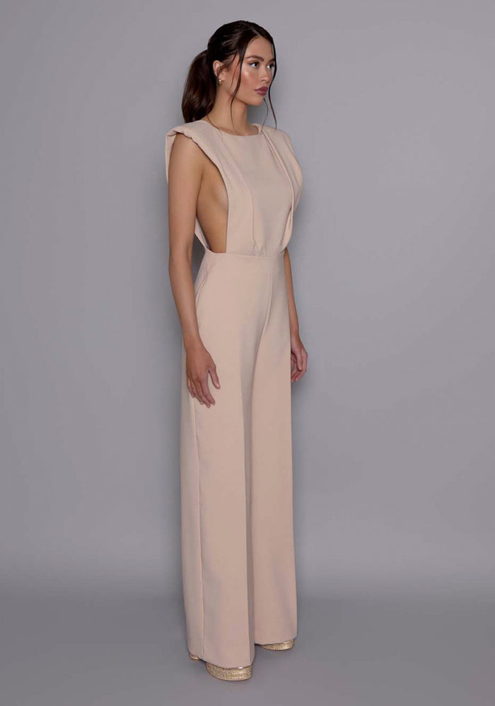 Side view of the VSPR Bronte Stone open-back Jumpsuit emphasizing the elongating wide-leg trousers and structured bodice with a tailored fit.