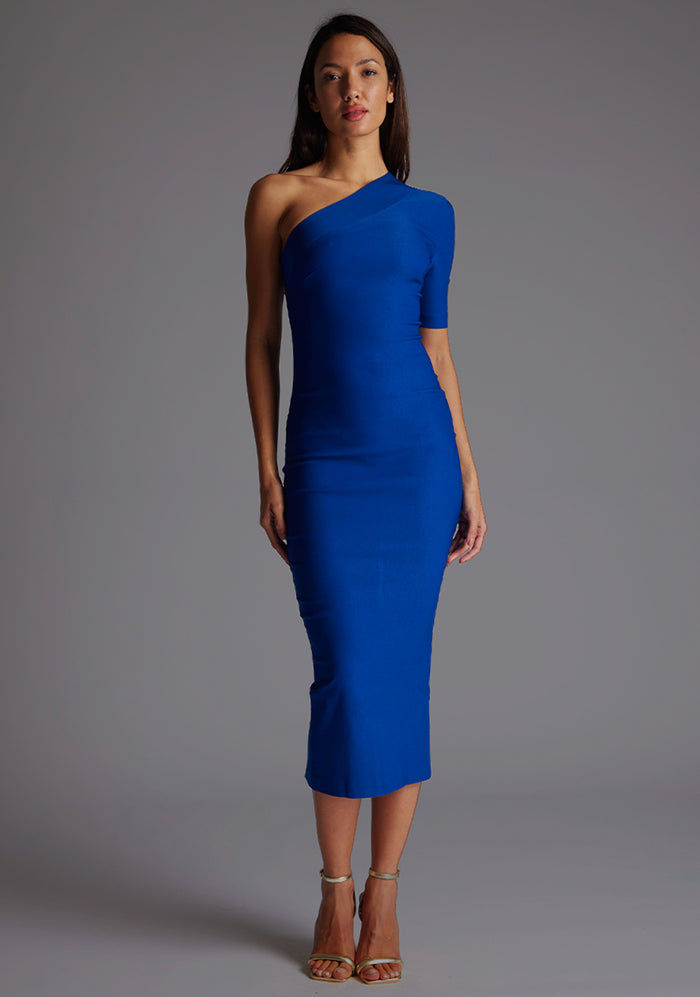 Front image of model wearing a cobalt midaxi dress with a eye-catching asymmetric design with a stunning one-sleeve detail and slim fit enhances your curves and creates a flattering silhouette. The design featured is the Vesper Erin Cobalt Midaxi Dress.