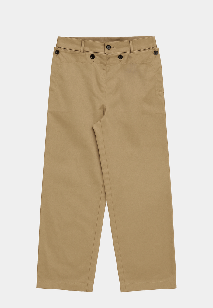 Beige MSGM pantalon button pants with button detail, luxury lifestyle brand style.